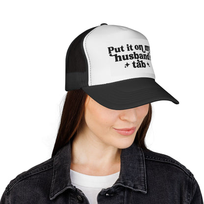 Put It On My Husband's Tab Trucker Hat