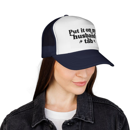 Put It On My Husband's Tab Trucker Hat
